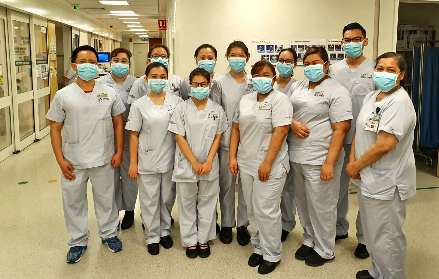  ​NC Syafiq (second from extreme right) has been working at Ward 68 for five years and manages a team of 15 nurses. He started out at Ward 73 (Internal Medicine) ten years ago. 