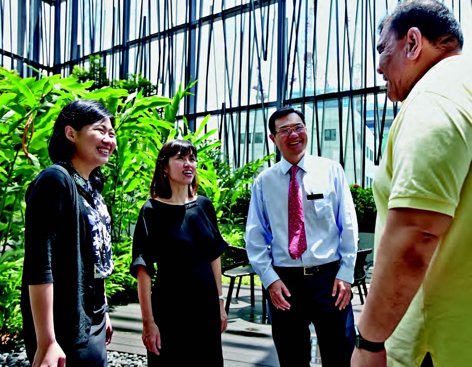  ​(Left to right) Dr Tricia Kuo, Dr Cherylin Fu, Associate Professor Emile Tan, and patient Mr Leong.