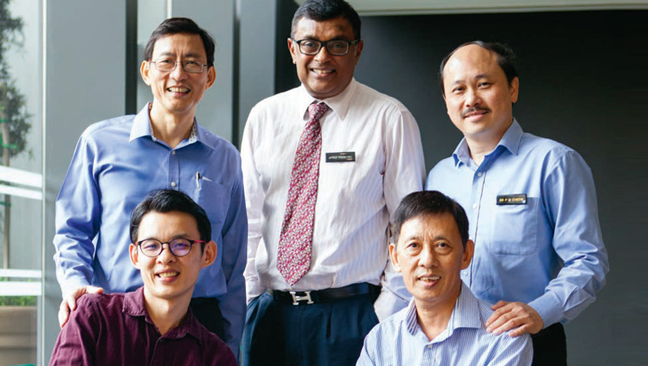  ​Mr Chen Qingzhong, whose blood group is A+, donated part of his liver to his father, Mr Chen Yu Hui, whose blood group is B+, in a 12-hour transplant procedure. (Standing, from left ) The transplant team included Professor Alexander Chung, Associate Professor Jeyaraj Prema Raj and Associate Professor Cheow Peng Chung – all from SGH’s Department of Hepato-pancreatobiliary Surgery.